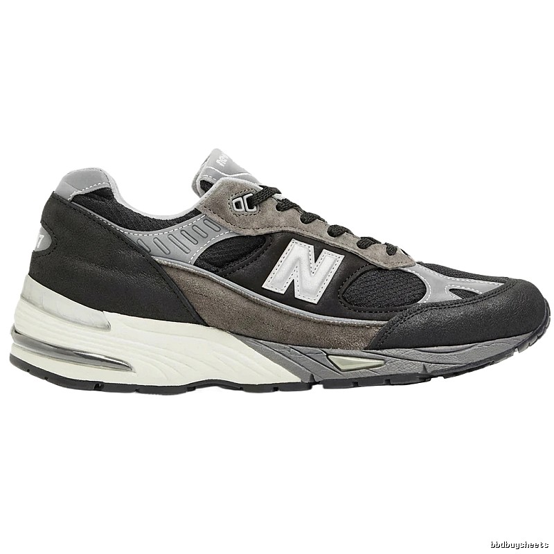 New Balance retro style black and gray sports shoes