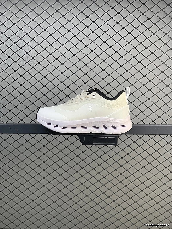 On Cloud Runners in White and Black, Finished with Layered Mesh Upper