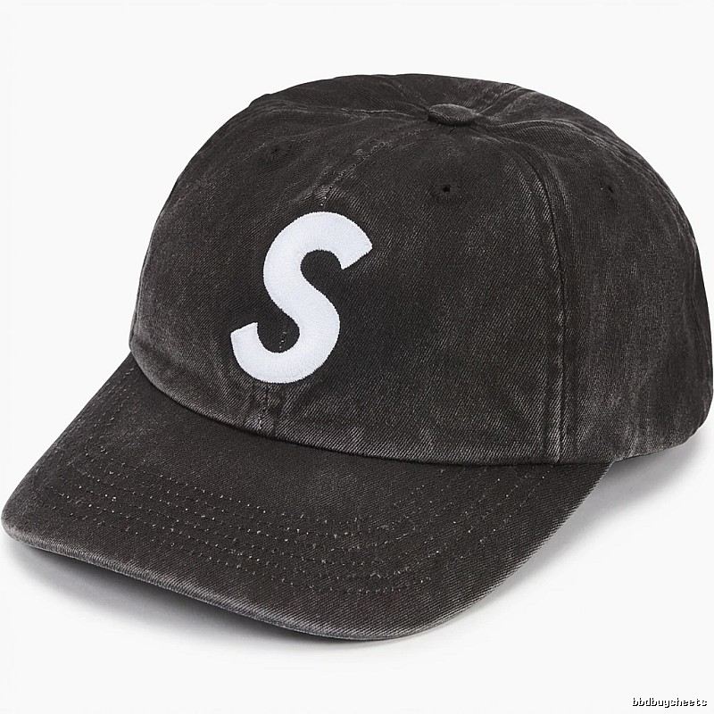 Vintage-style black hat with Supreme letters